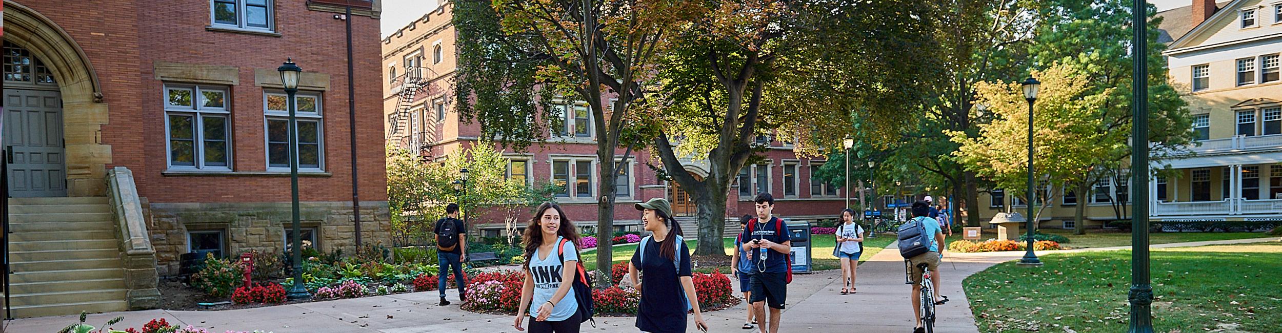 students walking across campus