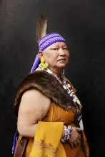 Color Image of indigenous woman in traditional outfit