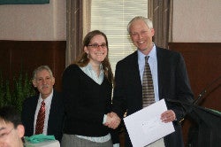 Leah receiving award