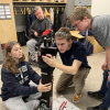 Students work on robotics in think[box]
