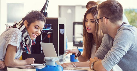 photo of students studying outside