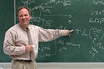 Teacher at Chalkboard