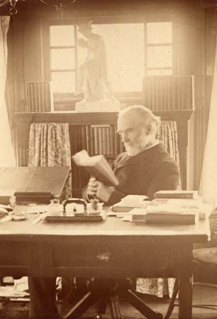 Hiram C. Haydn in his study, 1900?