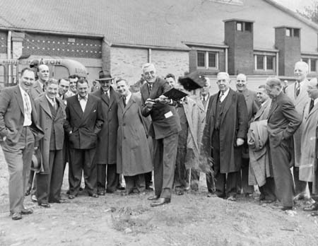 Winfred Leutner breaking ground for the Karl E. Davis Memorial Building, 1946