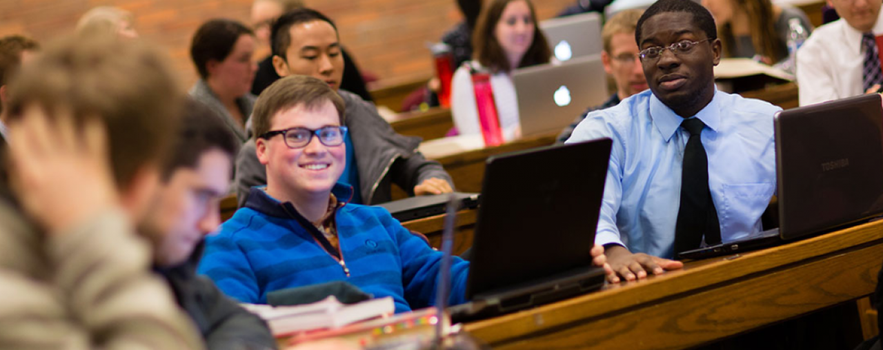 CWRU Law students talking in class together