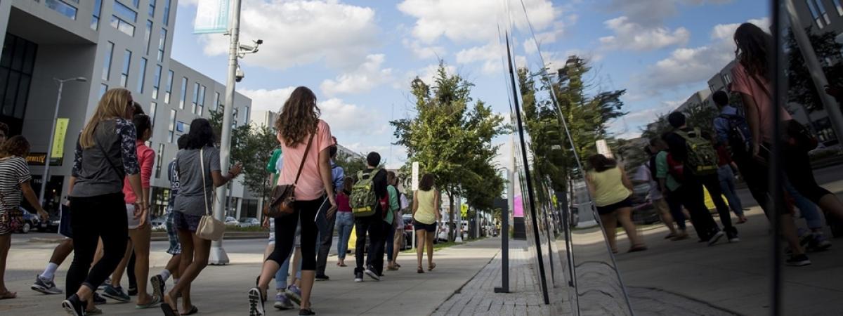 students walking down Euclid avenue on the case western reserve university campus
