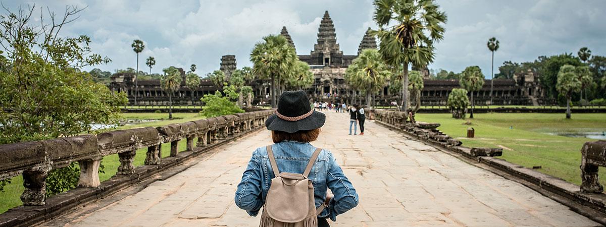 A CWRU law student walking in Cambodia