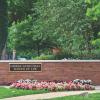 Outside shot of the law school showing the "George Gund Hall School of Law" sign
