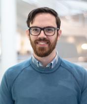 Evan Meszaros in the library atrium
