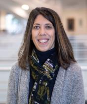 Gina Midlik in the library atrium