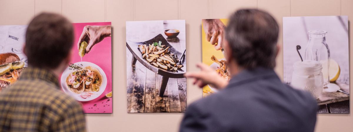 People looking at an exhibit.