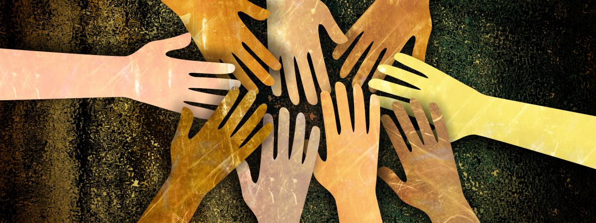 multi-racial hands in a circle
