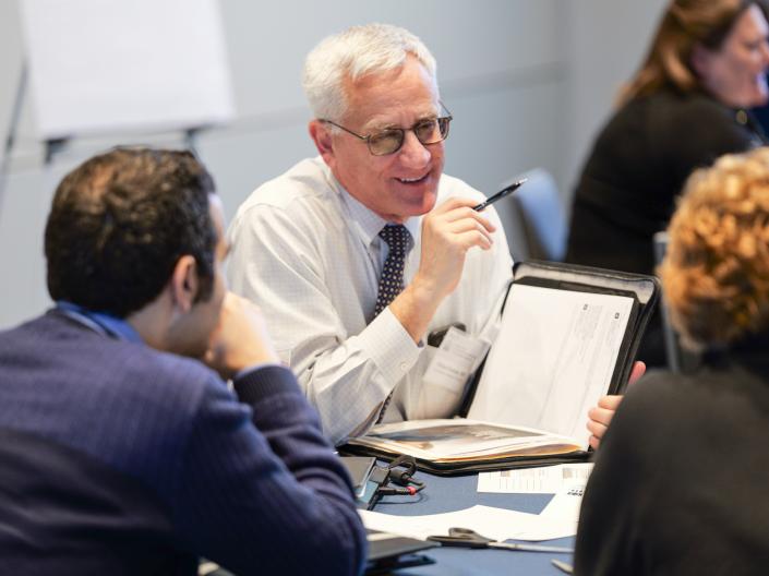 Photo of group of people talking