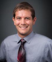 Image of headshot of Tom McKenzie