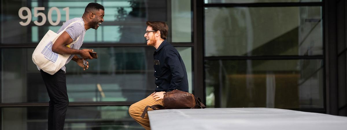 Two med students outside of the Samson Pavillion