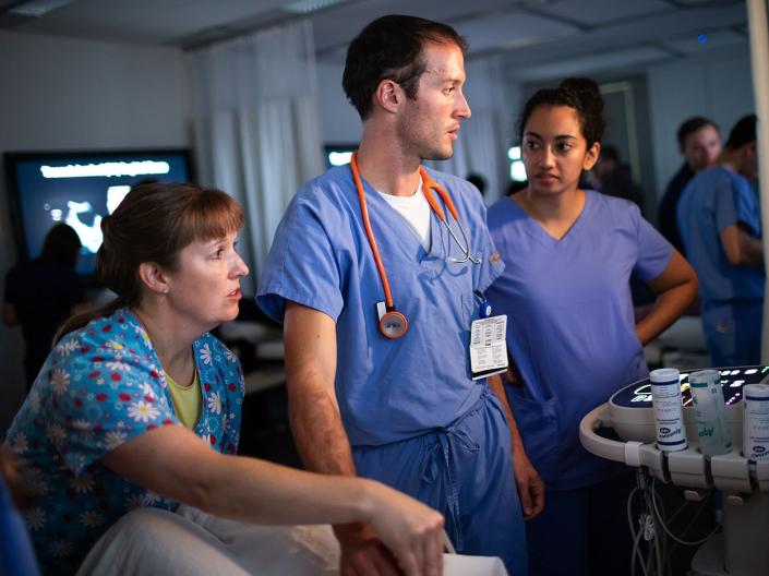 CWRU medical students reviewing a patient scan