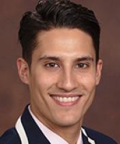 Image of headshot of Scott Plunkett