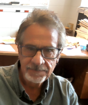 Man with glasses and short hair