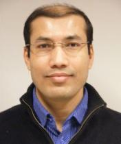 Headshot of Abdus Sattar smiling.