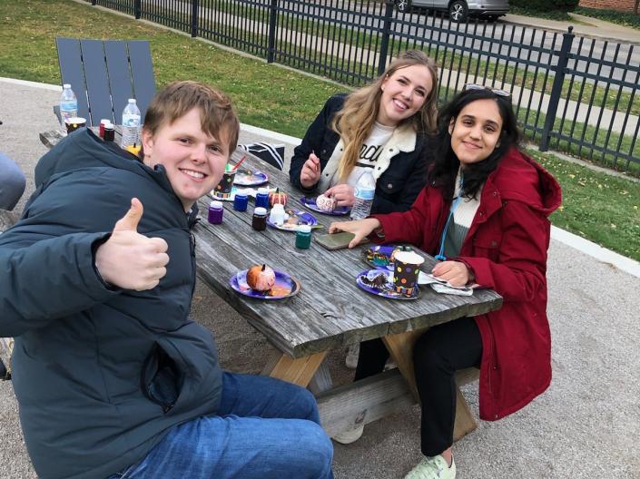 3 MPH students at a social event
