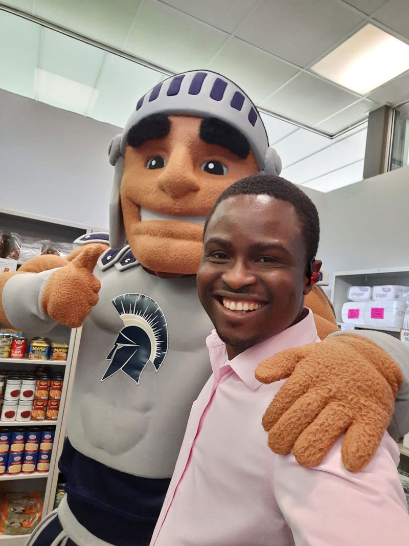 Ayowole Ajiboye with Spartie