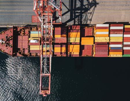 Overhead photo of a docked container ship