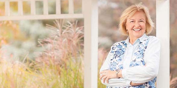 Formal Portrait of Genevieve Szuba smilling.