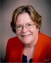 Lauren Currie in red blazer