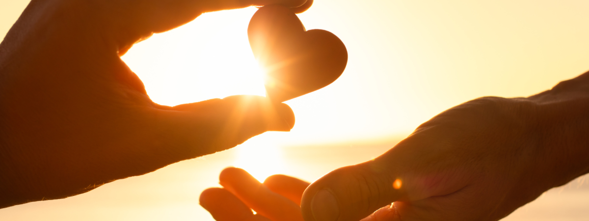Hands holding a heart