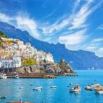 View of houses along the Amalfi Coast with boats in the water