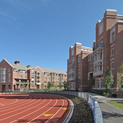 Exterior of dorms with the running track in front