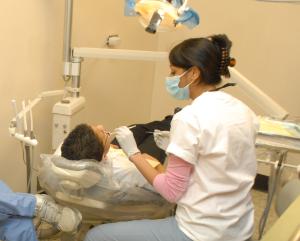 Woman observing a clinic patient.