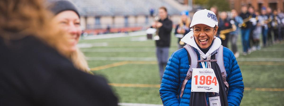 Alumni gather chatting at the 2022 Stephanie Tubbs Jones race