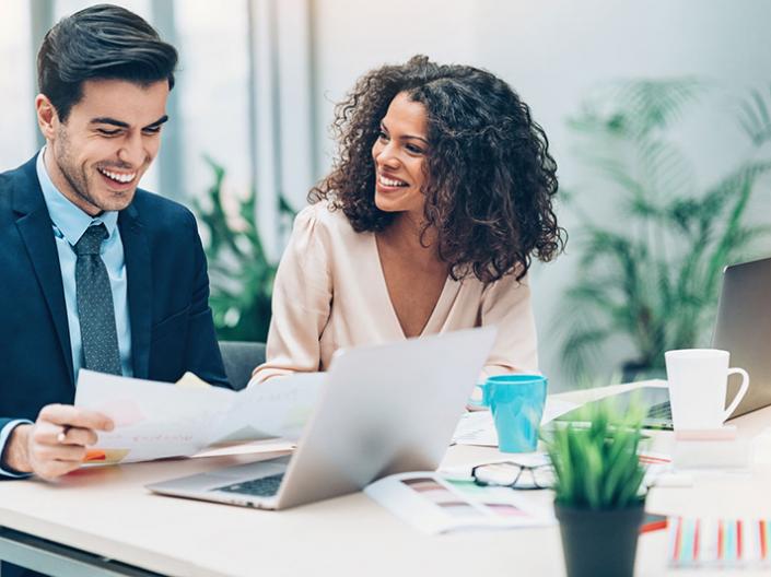 Two business professionals smiling