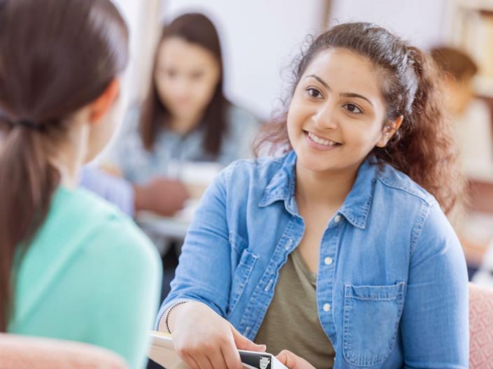 Female Student interviewing for a position