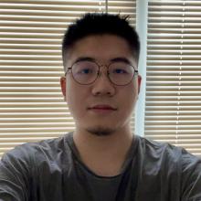 A headshot of Sai Jiang