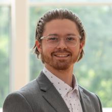 A headshot of Jonah Mudge