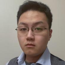 A headshot of Jianfeng Zhou