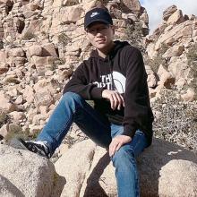 A headshot of Yao Fu