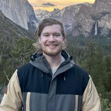 A headshot of Evan Harber