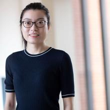 A headshot of An Wang