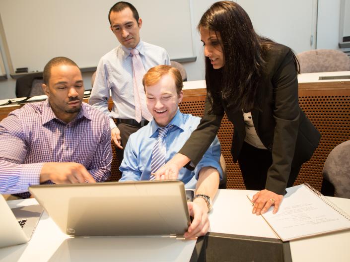 students reviewing information on a computer