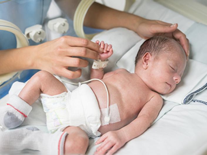 A doctor and baby in the hospital