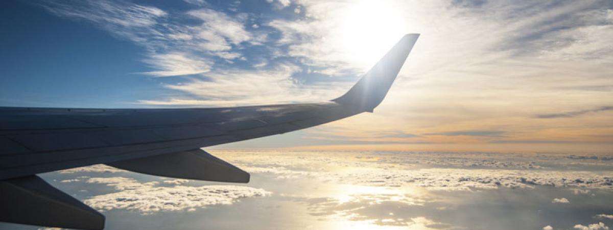 Plane in flight banner image